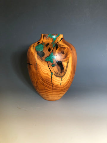 WT #188, Hollow Form Vessel from Peach with Malachite and Jet inlay.