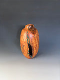WT #304, Hollow Form Bottle from Almond with Malachite inlay.