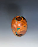 WT #304, Hollow Form Bottle from Almond with Malachite inlay.