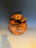 WT #310, vase from Almond with Jet inlay.
