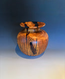 WT #310, vase from Almond with Jet inlay.