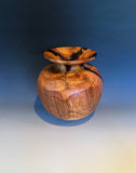 WT #310, vase from Almond with Jet inlay.