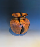 WT #310, vase from Almond with Jet inlay.