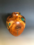 WT #188, Hollow Form Vessel from Peach with Malachite and Jet inlay.