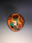 WT #188, Hollow Form Vessel from Peach with Malachite and Jet inlay.