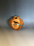 WT #204, Hollow Form Vessel from Peach with Jet and Turquoise inlay.