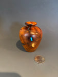 WT #252, Miniature Hollow Form Vessel from Osage Orange with Turquoise inlay.