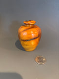 WT #252, Miniature Hollow Form Vessel from Osage Orange with Turquoise inlay.