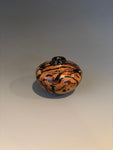 Wt # 290, Miniature Hollow Form Vessel from Jarrah Burl with Jet inlay.