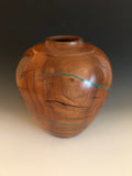 WT #96, Hollow Form Vessel from Lambert Cherry with Malachite &Jet inlay.  SOLD
